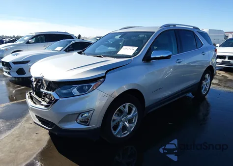 2018 Chevrolet Equinox Premier z USA, uszkodzony, nr VIN 2GNAXMEV3J6203900
